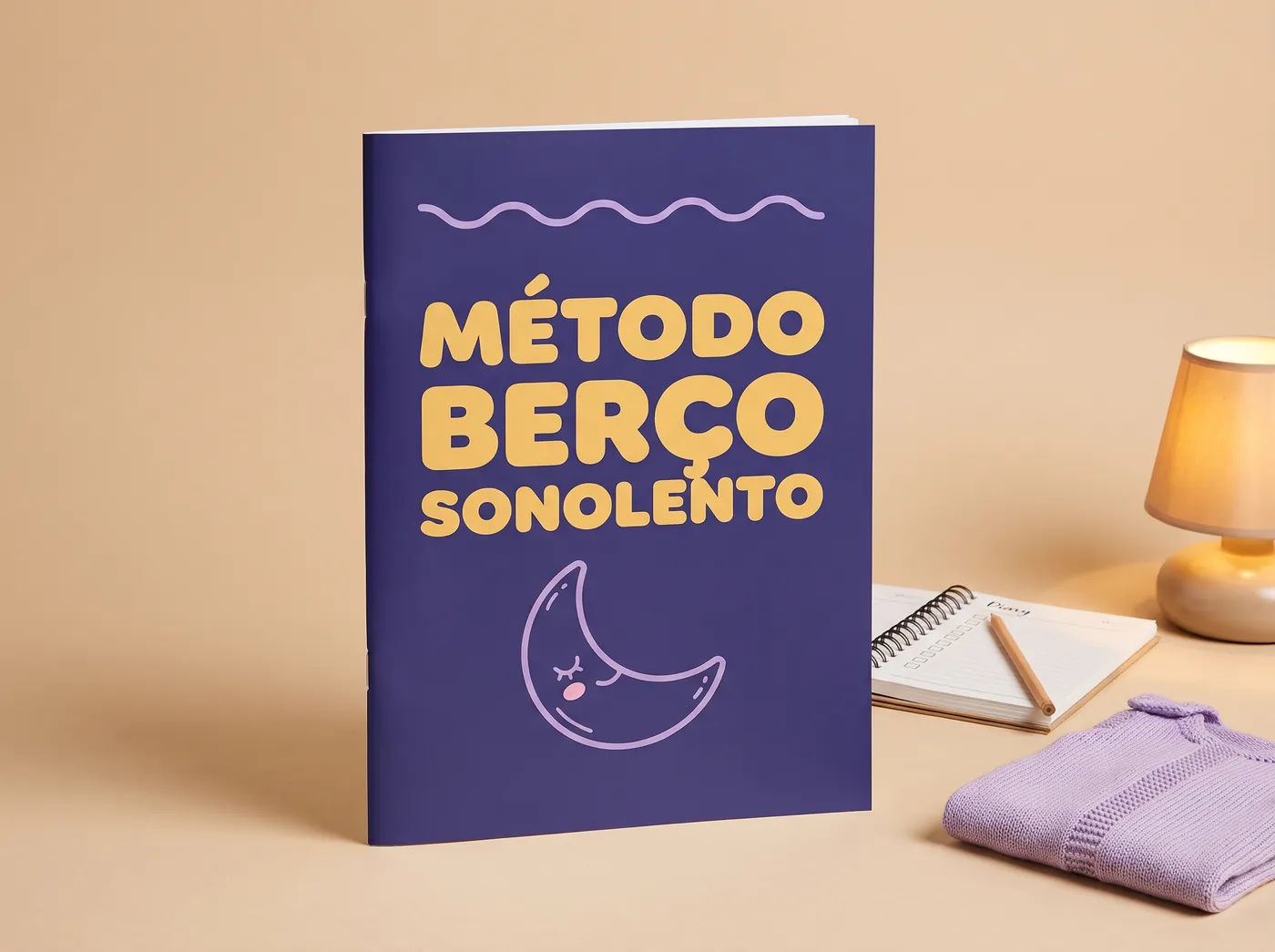 Ebook Método Berço Sonolento impresso ao lado do Diário de 21 Noites e de um abajur aceso